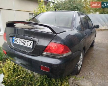 Серый Мицубиси Лансер, объемом двигателя 1.6 л и пробегом 260 тыс. км за 2750 $, фото 5 на Automoto.ua