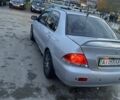 Мицубиси Лансер 2003 в Белой Церкве на Automoto.ua Серый Мицубиси Лансер, объемом двигателя 1.58 л и пробегом 350 тыс. км за 3300 $, фото 5 на Automoto.ua
