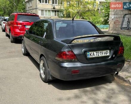 Сірий Міцубісі Lancer, об'ємом двигуна 1.6 л та пробігом 272 тис. км за 5100 $, фото 1 на Automoto.ua