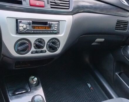 Сірий Міцубісі Lancer, об'ємом двигуна 1.6 л та пробігом 177 тис. км за 4500 $, фото 7 на Automoto.ua