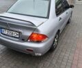 Сірий Міцубісі Lancer, об'ємом двигуна 1.58 л та пробігом 320 тис. км за 3700 $, фото 13 на Automoto.ua