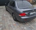 Сірий Міцубісі Lancer, об'ємом двигуна 1.58 л та пробігом 290 тис. км за 3900 $, фото 3 на Automoto.ua