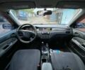 Сірий Міцубісі Lancer, об'ємом двигуна 1.58 л та пробігом 307 тис. км за 3800 $, фото 7 на Automoto.ua