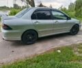Сірий Міцубісі Lancer, об'ємом двигуна 2 л та пробігом 240 тис. км за 3500 $, фото 3 на Automoto.ua