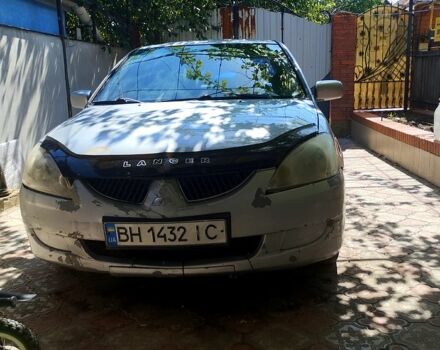 Серый Мицубиси Лансер, объемом двигателя 1.6 л и пробегом 308 тыс. км за 3500 $, фото 11 на Automoto.ua