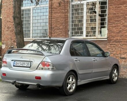 Серый Мицубиси Лансер, объемом двигателя 2 л и пробегом 180 тыс. км за 3700 $, фото 4 на Automoto.ua