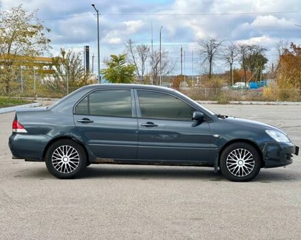 Серый Мицубиси Лансер, объемом двигателя 1.6 л и пробегом 490 тыс. км за 1799 $, фото 4 на Automoto.ua