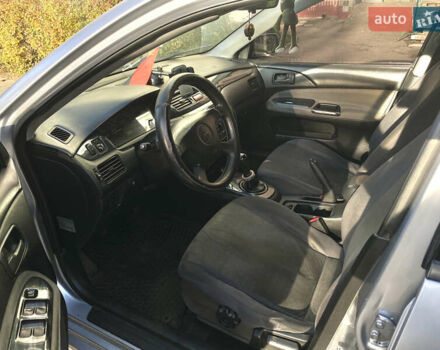 Сірий Міцубісі Lancer, об'ємом двигуна 1.3 л та пробігом 376 тис. км за 3700 $, фото 13 на Automoto.ua