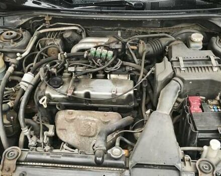 Сірий Міцубісі Lancer, об'ємом двигуна 1.58 л та пробігом 110 тис. км за 2999 $, фото 15 на Automoto.ua