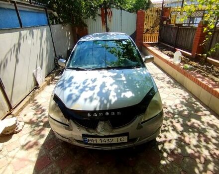 Серый Мицубиси Лансер, объемом двигателя 1.6 л и пробегом 308 тыс. км за 3500 $, фото 9 на Automoto.ua