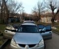 Сірий Міцубісі Lancer, об'ємом двигуна 1.6 л та пробігом 300 тис. км за 2000 $, фото 1 на Automoto.ua