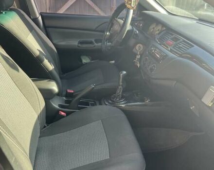 Сірий Міцубісі Lancer, об'ємом двигуна 1.58 л та пробігом 262 тис. км за 3900 $, фото 7 на Automoto.ua