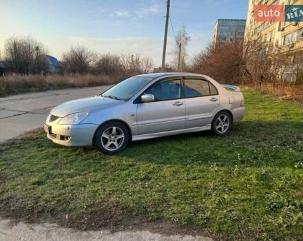 Серый Мицубиси Лансер, объемом двигателя 2 л и пробегом 300 тыс. км за 2850 $, фото 1 на Automoto.ua