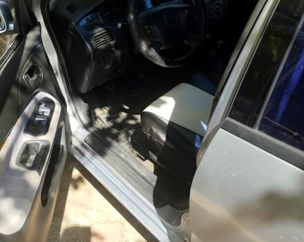 Серый Мицубиси Лансер, объемом двигателя 1.6 л и пробегом 308 тыс. км за 3500 $, фото 4 на Automoto.ua