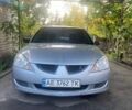 Сірий Міцубісі Lancer, об'ємом двигуна 1.3 л та пробігом 248 тис. км за 3000 $, фото 1 на Automoto.ua