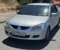 Сірий Міцубісі Lancer, об'ємом двигуна 1.3 л та пробігом 240 тис. км за 4000 $, фото 1 на Automoto.ua