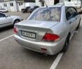 Сірий Міцубісі Lancer, об'ємом двигуна 1.6 л та пробігом 265 тис. км за 5200 $, фото 4 на Automoto.ua