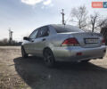 Мицубиси Лансер 2004 в Днепре (Днепропетровске) на Automoto.ua Серый Мицубиси Лансер, объемом двигателя 1.59 л и пробегом 294 тыс. км за 4699 $, фото 3 на Automoto.ua