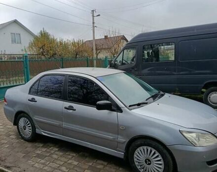 Сірий Міцубісі Lancer, об'ємом двигуна 1.58 л та пробігом 439 тис. км за 2500 $, фото 2 на Automoto.ua