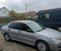 Сірий Міцубісі Lancer, об'ємом двигуна 1.58 л та пробігом 439 тис. км за 2500 $, фото 2 на Automoto.ua