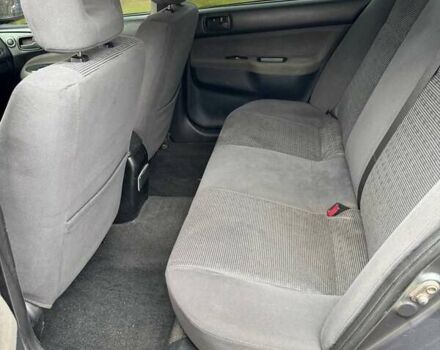 Серый Мицубиси Лансер, объемом двигателя 1.58 л и пробегом 313 тыс. км за 4650 $, фото 3 на Automoto.ua