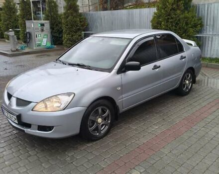 Сірий Міцубісі Lancer, об'ємом двигуна 1.58 л та пробігом 320 тис. км за 3700 $, фото 1 на Automoto.ua
