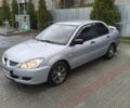 Сірий Міцубісі Lancer, об'ємом двигуна 1.58 л та пробігом 320 тис. км за 3700 $, фото 1 на Automoto.ua