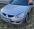 Сірий Міцубісі Lancer, об'ємом двигуна 1.58 л та пробігом 273 тис. км за 2900 $, фото 1 на Automoto.ua