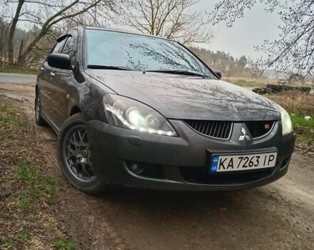 Сірий Міцубісі Lancer, об'ємом двигуна 1.58 л та пробігом 360 тис. км за 4000 $, фото 2 на Automoto.ua
