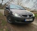 Сірий Міцубісі Lancer, об'ємом двигуна 1.58 л та пробігом 360 тис. км за 4000 $, фото 2 на Automoto.ua