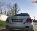 Мицубиси Лансер 2004 в Днепре (Днепропетровске) на Automoto.ua Серый Мицубиси Лансер, объемом двигателя 1.59 л и пробегом 294 тыс. км за 4699 $, фото 5 на Automoto.ua
