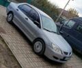 Сірий Міцубісі Lancer, об'ємом двигуна 1.58 л та пробігом 439 тис. км за 2500 $, фото 7 на Automoto.ua