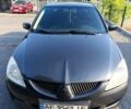 Сірий Міцубісі Lancer, об'ємом двигуна 1.6 л та пробігом 303 тис. км за 3800 $, фото 1 на Automoto.ua