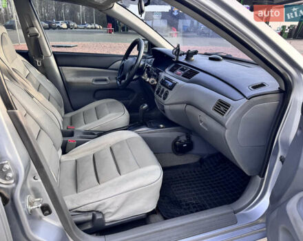 Сірий Міцубісі Lancer, об'ємом двигуна 1.3 л та пробігом 450 тис. км за 2650 $, фото 11 на Automoto.ua