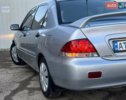 Серый Мицубиси Лансер, объемом двигателя 1.6 л и пробегом 320 тыс. км за 3650 $, фото 20 на Automoto.ua