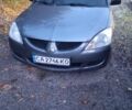 Мицубиси Лансер 2004 в Черкассах на Automoto.ua Серый Мицубиси Лансер, объемом двигателя 1.6 л и пробегом 313 тыс. км за 4800 $, фото 1 на Automoto.ua