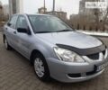 Сірий Міцубісі Lancer, об'ємом двигуна 1.3 л та пробігом 210 тис. км за 4400 $, фото 10 на Automoto.ua