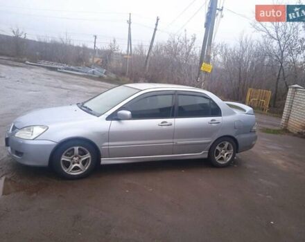 Серый Мицубиси Лансер, объемом двигателя 2 л и пробегом 300 тыс. км за 2850 $, фото 10 на Automoto.ua