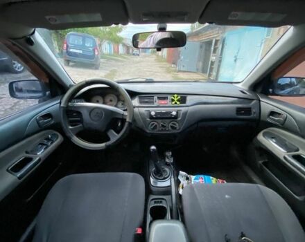 Сірий Міцубісі Lancer, об'ємом двигуна 1.6 л та пробігом 307 тис. км за 3700 $, фото 6 на Automoto.ua