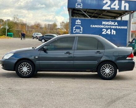 Серый Мицубиси Лансер, объемом двигателя 1.6 л и пробегом 490 тыс. км за 1799 $, фото 5 на Automoto.ua