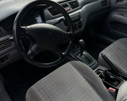 Серый Мицубиси Лансер, объемом двигателя 1.29 л и пробегом 263 тыс. км за 3400 $, фото 7 на Automoto.ua