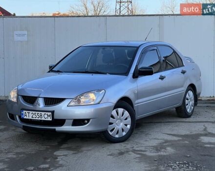 Серый Мицубиси Лансер, объемом двигателя 1.6 л и пробегом 320 тыс. км за 3650 $, фото 12 на Automoto.ua