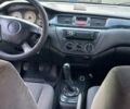 Серый Мицубиси Лансер, объемом двигателя 1.58 л и пробегом 260 тыс. км за 3200 $, фото 13 на Automoto.ua