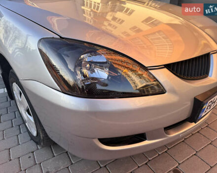 Сірий Міцубісі Lancer, об'ємом двигуна 1.3 л та пробігом 450 тис. км за 2750 $, фото 7 на Automoto.ua