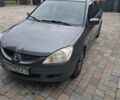 Сірий Міцубісі Lancer, об'ємом двигуна 1.58 л та пробігом 290 тис. км за 3900 $, фото 1 на Automoto.ua