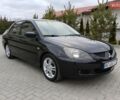 Сірий Міцубісі Lancer, об'ємом двигуна 2 л та пробігом 299 тис. км за 4650 $, фото 1 на Automoto.ua