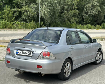 Сірий Міцубісі Lancer, об'ємом двигуна 2 л та пробігом 200 тис. км за 3550 $, фото 4 на Automoto.ua