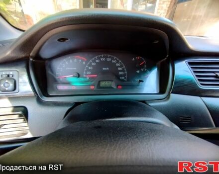 Серый Мицубиси Лансер, объемом двигателя 1.6 л и пробегом 308 тыс. км за 3500 $, фото 3 на Automoto.ua