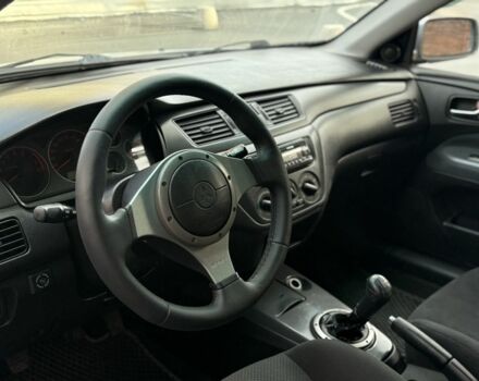 Серый Мицубиси Лансер, объемом двигателя 2 л и пробегом 180 тыс. км за 3700 $, фото 10 на Automoto.ua