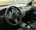 Серый Мицубиси Лансер, объемом двигателя 2 л и пробегом 180 тыс. км за 3700 $, фото 10 на Automoto.ua